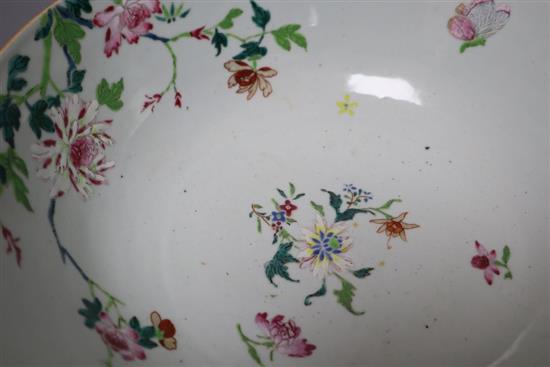 An 18th century Chinese porcelain punch bowl, brightly painted in enamels, 30cm